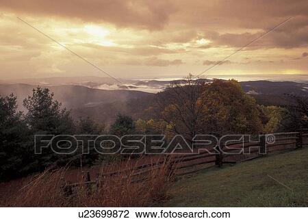 fog, mountains, Blue Ridge, NC, North Carolina, Scenic view of fog over the mountains from the Blue Ridge Parkway in autumn in North Carolina. View Large Photo Image Stock Image - fog, mountains, Blue Ridge, NC, North Carolina, Scenic view of fog over the mountains from the Blue Ridge Parkway in autumn in North Carolina.. Fotosearch
