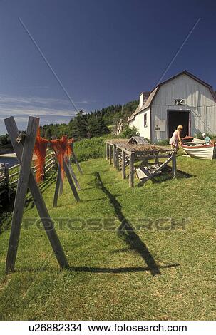 Forillon National Park, Gaspe Peninsula, Quebec, Canada, Drying nets at Anse Blanchette in Forillon National Park on the Gaspe Peninsula on the Gulf of St. Lawrence in Quebec. View Large Photo Image Picture - Forillon National Park, Gaspe Peninsula, Quebec, Canada, Drying nets at Anse Blanchette in Forillon National Park on the Gaspe Peninsula on the Gulf of St. Lawrence in Quebec.. Fotosearch