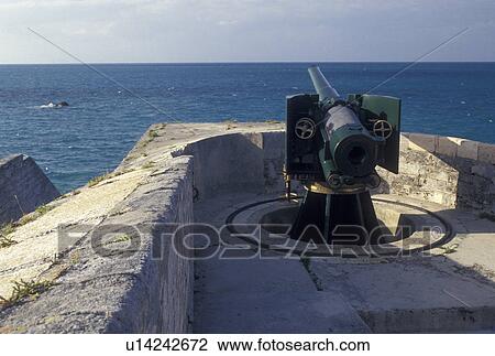 fort, Bermuda, St. George's Parish, Cannon on the ramparts of Fort St. Catherine overlooking the Atlantic Ocean in St George in Bermuda. View Large Photo Image Stock Image - fort, Bermuda, St. George's Parish, Cannon on the ramparts of Fort St. Catherine overlooking the Atlantic Ocean in St George in Bermuda.. Fotosearch