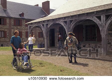 Stock Image -  fort, Cape Breton, Nova Scotia, NS, Canada, Atlantic Ocean, Tourists visiting the Fortress of Louisbourg National Historic Site on Cape Breton Island in Nova Scotia. . Fotosearch