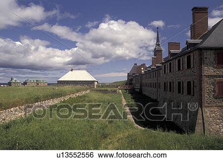 Stock Photograph -  fort, Cape Breton, Nova Scotia, NS, Canada, Atlantic Ocean, King's Bastion at the Fortress of Louisbourg National Historic Site on Cape Breton Island in Nova Scotia. . Fotosearch