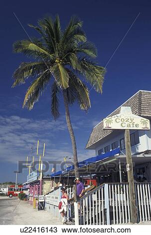 Stock Image -  Fort Myers, FL, Gulf of Mexico, Florida, Cafes, and gift shops along the beach front in Fort Myers.. Fotosearch