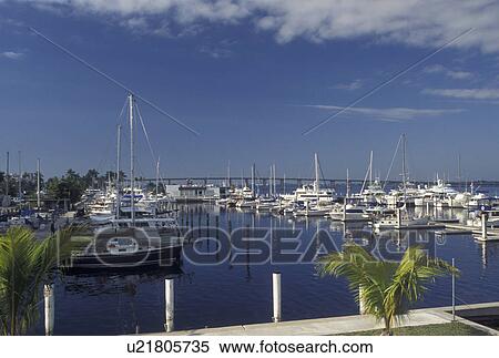 Fort Myers, FL, Gulf of Mexico, Florida, Boats docked at a marina at City Yacht Basin in Fort Myers. View Large Photo Image Stock Photography - Fort Myers, FL, Gulf of Mexico, Florida, Boats docked at a marina at City Yacht Basin in Fort Myers.. Fotosearch