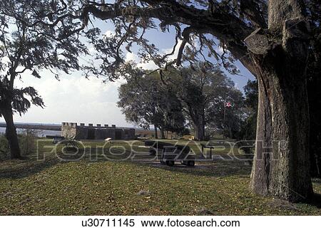 Stock Photography -  fort, St. Simons Island, GA, Fort Frederica Nat'l Monument, Golden Isles, Georgia, Cannons displayed on the grounds of Fort Frederica National Monument on Saint Simons Island in Georgia.. Fotosearch