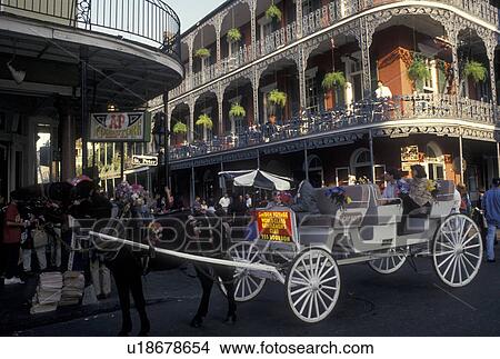 Picture -  French Quarter, horse-drawn carriage, New Orleans, LA, Louisiana, Carriage pulled by a mule along the street in the French Quarter in New Orleans. . Fotosearch