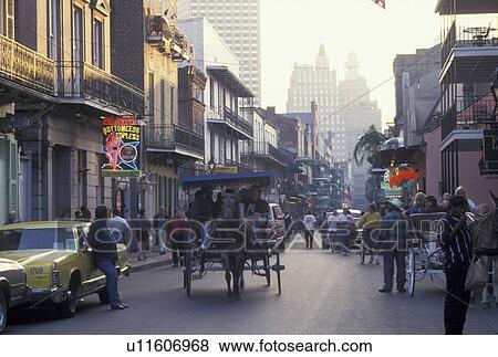 Stock Photo -  French Quarter, horse-drawn carriage, Bourbon Street, New Orleans, LA, Louisiana, Carriage ride along Bourbon Street in the French Quarter in New Orleans. . Fotosearch
