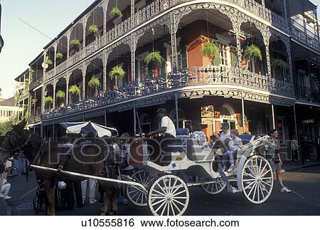 French Quarter, horse-drawn carriage, New Orleans, LA, Louisiana, Carriage pulled by a mule along the street in the French Quarter in New Orleans. View Large Photo Image Stock Photograph - French Quarter, horse-drawn carriage, New Orleans, LA, Louisiana, Carriage pulled by a mule along the street in the French Quarter in New Orleans. . Fotosearch