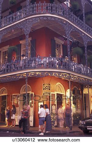 French Quarter, New Orleans, LA, Louisiana, Royal Cafe, a two story restaurant with cast iron balconies, in the French Quarter in New Orleans in the evening. View Large Photo Image Stock Image - French Quarter, New Orleans, LA, Louisiana, Royal Cafe, a two story restaurant with cast iron balconies, in the French Quarter in New Orleans in the evening. . Fotosearch