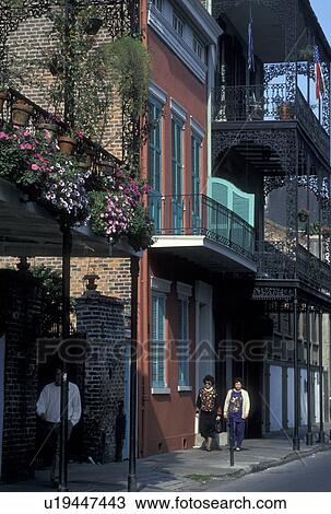 Stock Image -  French Quarter, New Orleans, Louisiana, LA, Ornate buildings with balconies along the street in the French Quarter in New Orleans.. Fotosearch