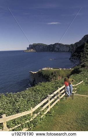 Gaspe Peninsula, Forillon National Park, Gulf of St. Lawrence, Quebec, Canada, People at overlook on Cap Bon Ami in Forillon National Park on the Gaspe Peninsula on the Gulf of St. Lawrence in Quebec. View Large Photo Image Stock Image - Gaspe Peninsula, Forillon National Park, Gulf of St. Lawrence, Quebec, Canada, People at overlook on Cap Bon Ami in Forillon National Park on the Gaspe Peninsula on the Gulf of St. Lawrence in Quebec.. Fotosearch