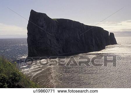 Gaspe Peninsula, Perce, Quebec, Canada, Rocher Perce, Gulf of St. Lawrence, Perce Rock (Rocher Perce) on the Gulf of St. Lawrence in Perce on Gaspe Peninsula in Quebec. View Large Photo Image Stock Image - Gaspe Peninsula, Perce, Quebec, Canada, Rocher Perce, Gulf of St. Lawrence, Perce Rock (Rocher Perce) on the Gulf of St. Lawrence in Perce on Gaspe Peninsula in Quebec.. Fotosearch
