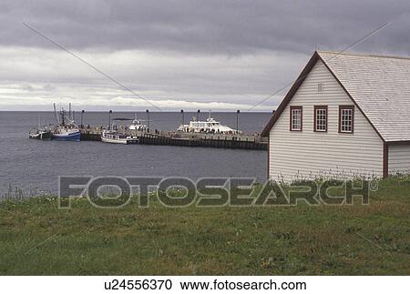 Gaspe Peninsula, Perce, Quebec, Canada, Gulf of St. Lawrence, Scenic view of the Gulf of St. Lawrence and Le Chafaud museum in Perce on Gaspe Peninsula in Quebec. View Large Photo Image Stock Image - Gaspe Peninsula, Perce, Quebec, Canada, Gulf of St. Lawrence, Scenic view of the Gulf of St. Lawrence and Le Chafaud museum in Perce on Gaspe Peninsula in Quebec.. Fotosearch