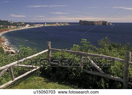 Stock Image -  Gaspe Peninsula, Perce Rock, Perce, Quebec, Canada, Gulf of St. Lawrence, Scenic view of Rocher Perce (Perce Rock) on the Gulf of St. Lawrence in Perce on Gaspe Peninsula in Quebec.. Fotosearch