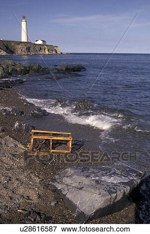Stock Photo -  Gaspe Peninsula, Quebec, Canada, Gulf of St. Lawrence, Cap des Rosiers Lighthouse on the Gaspe Peninsula on the Gulf of St. Lawrence in Quebec.. Fotosearch