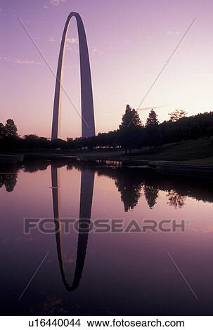 Gateway Arch, St. Louis, MO, Missouri, The Gateway Arch reflects in the pond at sunrise in Saint Louis. Jefferson National Expansion Memorial. Gateway to the West. View Large Photo Image Picture - Gateway Arch, St. Louis, MO, Missouri, The Gateway Arch reflects in the pond at sunrise in Saint Louis. Jefferson National Expansion Memorial. Gateway to the West.. Fotosearch