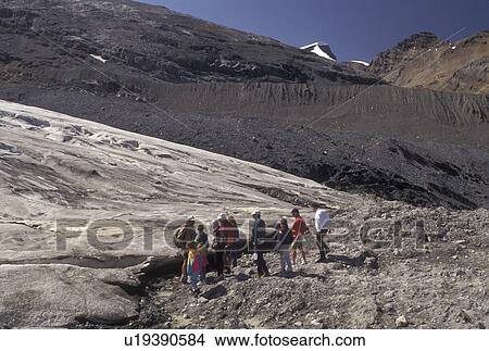 glacier, icefield, Jasper National Park, Canada, Alberta, Canadian Rockies, Interpretive talk with a group of people on Athabasca Glacier on Columbia Icefield in Jasper National Park in Alberta. View Large Photo Image Picture - glacier, icefield, Jasper National Park, Canada, Alberta, Canadian Rockies, Interpretive talk with a group of people on Athabasca Glacier on Columbia Icefield in Jasper National Park in Alberta.. Fotosearch