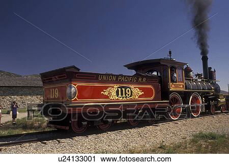 Stock Image -  Golden Spike National Historic Site, locomotive, train, UT, Utah, The 1869 Steam Locomotive 119 at the Golden Spike Nat'l Historic Site where the Union Pacific and Central Pacific rails met on May 10, 1869. Fotosearch