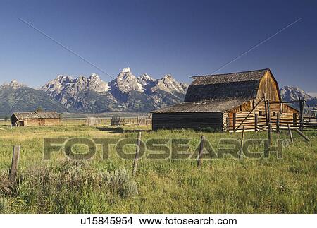 Picture -  Grand Teton National Park, Jackson Hole, WY, Wyoming, Old barn at Antelope Flats with a view of the Grand Teton Mountains in the background in Grand Teton Nat'l Park in Wyoming.. Fotosearch