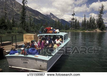 Stock Photo -  Grand Teton National Park, Jenny Lake, WY, Jackson Hole, Wyoming, Boat excursion on Jenny Lake in Grand Teton Nat'l Park in Wyoming.. Fotosearch