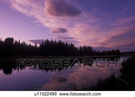 Grand Teton National Park, Snake River, Jackson Hole, WY, Wyoming, Scenic view of the clouds and trees reflecting in the calm waters of the Snake River at sunset in Grand Teton Nat'l Park in Wyoming. View Large Photo Image Stock Photo - Grand Teton National Park, Snake River, Jackson Hole, WY, Wyoming, Scenic view of the clouds and trees reflecting in the calm waters of the Snake River at sunset in Grand Teton Nat'l Park in Wyoming.. Fotosearch