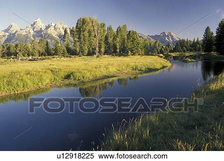 Grand Teton National Park, Snake River, Jackson Hole, WY, Wyoming, Scenic view of the Snake River and the Grand Teton Mountains in Grand Teton Nat'l Park in Wyoming. View Large Photo Image Stock Photography - Grand Teton National Park, Snake River, Jackson Hole, WY, Wyoming, Scenic view of the Snake River and the Grand Teton Mountains in Grand Teton Nat'l Park in Wyoming.. Fotosearch
