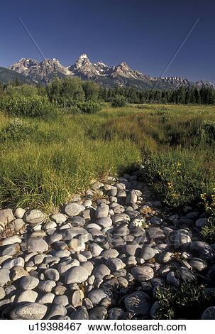 Stock Photo -  Grand Teton National Park, WY, Teton Mountains, Jackson Hole, Wyoming, Picturesque view of the Grand Teton Mountains from a scenic overlook in Grand Teton Nat'l Park in Wyoming.. Fotosearch