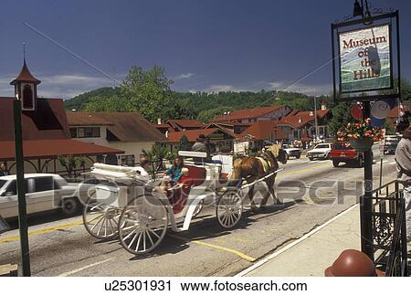 Helen, GA, carriage ride, Alpine Village, Georgia, Horse-drawn carriage carries visitors through the alpine village of Helen in North Georgia. View Large Photo Image Stock Image - Helen, GA, carriage ride, Alpine Village, Georgia, Horse-drawn carriage carries visitors through the alpine village of Helen in North Georgia.. Fotosearch