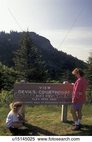 Stock Photography -  hike, NC, Blue Ridge Parkway, North Carolina, Mother and nine year old daughter at Devil's Courthouse Viewpoint along the Blue Ridge Parkway in North Carolina.. Fotosearch