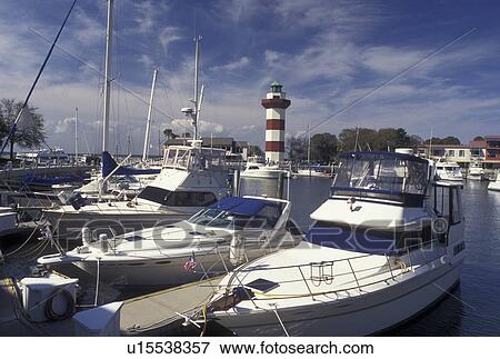 Stock Photo -  Hilton Head, SC, South Carolina, Marina and Lighthouse at Harbour Town Yacht Basin on Hilton Head Island.. Fotosearch