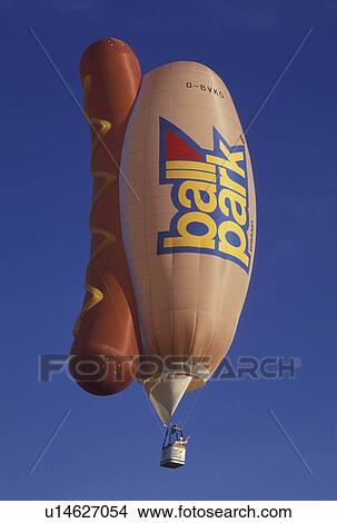 hot air balloon, Ball Park Franks, Atlanta, GA, Georgia, Hot air balloon shaped like a hot dog in a bun, advertising Ball Park Franks, rises up in the sky at the Dogwood Festival at Piedmont Park in the spring in Atlanta. View Large Photo Image Picture - hot air balloon, Ball Park Franks, Atlanta, GA, Georgia, Hot air balloon shaped like a hot dog in a bun, advertising Ball Park Franks, rises up in the sky at the Dogwood Festival at Piedmont Park in the spring in Atlanta.. Fotosearch