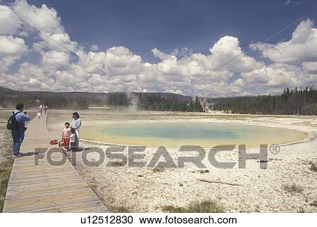 hot spring, geysers, Yellowstone National Park, WY, Wyoming, Mother and children pose for picture at Beauty Pool in Upper Geyser Basin in Yellowstone Nat'l Park in Wyoming. View Large Photo Image Stock Image - hot spring, geysers, Yellowstone National Park, WY, Wyoming, Mother and children pose for picture at Beauty Pool in Upper Geyser Basin in Yellowstone Nat'l Park in Wyoming.. Fotosearch