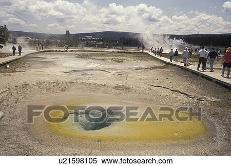 hot springs, geysers, Yellowstone National Park, WY, Wyoming, People walking on boardwalks in Upper Geyser Basin in Yellowstone Nat'l Park in Wyoming. View Large Photo Image Stock Photography - hot springs, geysers, Yellowstone National Park, WY, Wyoming, People walking on boardwalks in Upper Geyser Basin in Yellowstone Nat'l Park in Wyoming.. Fotosearch