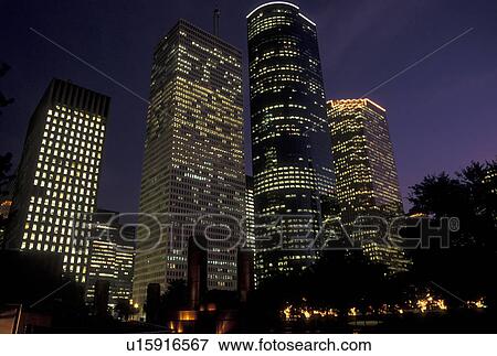 Houston, TX, Texas, Downtown skyline of Houston from Tranquility Park at sunset. View Large Photo Image Stock Photo - Houston, TX, Texas, Downtown skyline of Houston from Tranquility Park at sunset.. Fotosearch