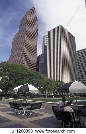 Houston, TX, Texas, Outdoor cafT at Hermann Square and downtown skyline of Houston. View Large Photo Image Stock Image - Houston, TX, Texas, Outdoor cafT at Hermann Square and downtown skyline of Houston.. Fotosearch