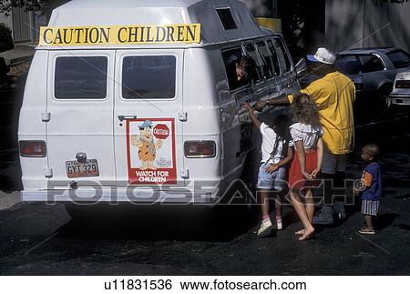 Ice Cream Truck, Atlanta, GA, Georgia, African American man buys ice cream for children at an ice cream truck in a parking lot in Atlanta. View Large Photo Image Stock Photograph - Ice Cream Truck, Atlanta, GA, Georgia, African American man buys ice cream for children at an ice cream truck in a parking lot in Atlanta.. Fotosearch