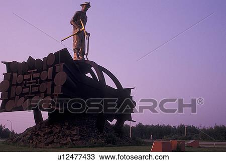 Stock Image -  iron, mining, Chisholm, MN, Mesabi Iron Range, Minnesota, The Iron Man Memorial at Ironworld Discovery Center in Chisholm.. Fotosearch