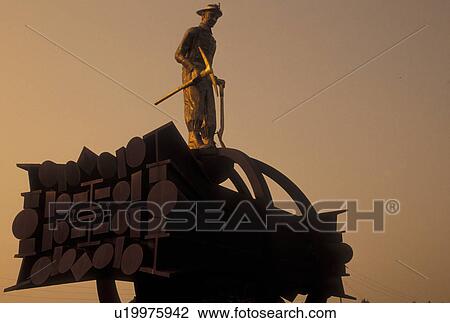 Stock Image -  iron, mining, Chisholm, MN, Mesabi Iron Range, Minnesota, The Iron Man Memorial at Ironworld Discovery Center in Chisholm.. Fotosearch