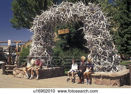 Jackson, elk antler arch, WY, Wyoming, People sitting under an arch made of elk antlers in Town Square in downtown Jackson. View Large Photo Image Stock Image - Jackson, elk antler arch, WY, Wyoming, People sitting under an arch made of elk antlers in Town Square in downtown Jackson.. Fotosearch