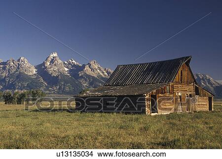 Jackson Hole, WY, Grand Teton National Park, Wyoming, Old wooden barn at Antelope Flats with a view of the Grand Teton Mountains in the background in Grand Teton Nat'l Park in Wyoming. View Large Photo Image Picture - Jackson Hole, WY, Grand Teton National Park, Wyoming, Old wooden barn at Antelope Flats with a view of the Grand Teton Mountains in the background in Grand Teton Nat'l Park in Wyoming.. Fotosearch