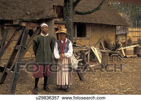 Jamestown, Virginia, VA, Colonial National Historical Park, Man and woman dressed in 17th-century attire at James Fort at the Jamestown Settlement a living history complex in Jamestown. View Large Photo Image Stock Photo - Jamestown, Virginia, VA, Colonial National Historical Park, Man and woman dressed in 17th-century attire at James Fort at the Jamestown Settlement a living history complex in Jamestown.. Fotosearch