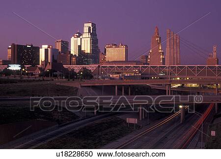 Stock Image -  Kansas City, skyline, MO, Missouri, Skyline of downtown Kansas City at sunset.. Fotosearch