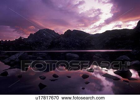 lake, sunrise, Wind River Range, mountain, Bridger-Teton National Forest, WY, Wyoming, Reflection of the rocks and surrounding mountains in the calm waters of Island Lake at sunrise in the Wind River Range Mountains in the Bridger-Teton Nat'l Forest in W View Large Photo Image Stock Image - lake, sunrise, Wind River Range, mountain, Bridger-Teton National Forest, WY, Wyoming, Reflection of the rocks and surrounding mountains in the calm waters of Island Lake at sunrise in the Wind River Range Mountains in the Bridger-Teton Nat'l Forest in W. Fotosearch