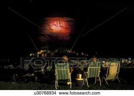 laser show, Stone Mountain, Atlanta, GA, Georgia, A crowd of people watch the laser show at night on Stone Mountain at Georgia's Stone Mountain Park in Stone Mountain.  View Large Photo Image Picture -  laser show, Stone Mountain, Atlanta, GA, Georgia, A crowd of people watch the laser show at night on Stone Mountain at Georgia's Stone Mountain Park in Stone Mountain. . Fotosearch