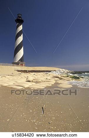lighthouse, Cape Hatteras National Seashore, Outer Banks, North Carolina, NC, Black and white striped Cape Hatteras Lighthouse on Cape Hatteras Nat'l Seashore on the Outer Banks. View Large Photo Image Stock Image - lighthouse, Cape Hatteras National Seashore, Outer Banks, North Carolina, NC, Black and white striped Cape Hatteras Lighthouse on Cape Hatteras Nat'l Seashore on the Outer Banks.. Fotosearch