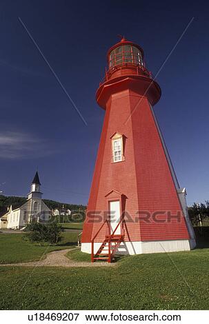 Stock Photo -  lighthouse, Gaspe Peninsula, Quebec, La Martre, Canada, Gulf of St. Lawrence, Red octagonal lighthouse museum in La Martre on the Gaspe Peninsula on the St. Lawrence River in Quebec.. Fotosearch