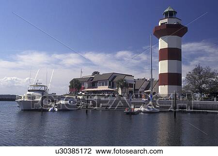Stock Image -  lighthouse, Hilton Head Island, SC, South Carolina, Lighthouse at Harbour Town Yacht Basin on Hilton Head Island.. Fotosearch