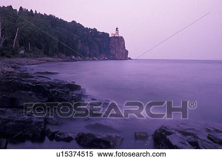 lighthouse, Lake Superior, North Shore Drive, Two Harbors, MN, Minnesota, Scenic view of Split Rock Lighthouse is situated on a high cliff on the north shore of Lake Superior at sunrise at Split Rock Lighthouse State Park in Two Harbors. View Large Photo Image Stock Photography - lighthouse, Lake Superior, North Shore Drive, Two Harbors, MN, Minnesota, Scenic view of Split Rock Lighthouse is situated on a high cliff on the north shore of Lake Superior at sunrise at Split Rock Lighthouse State Park in Two Harbors.. Fotosearch