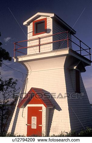 Stock Photo -  lighthouse, Wallace, NS, Nova Scotia, Canada, Gulf of St. Lawrence, Lighthouse in the fishing village of Wallace on the Northumberland Strait in Nova Scotia. . Fotosearch