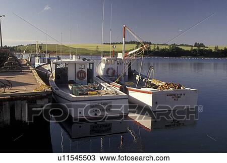Stock Image -  lobster fishing boats, Prince Edward Island, Canada, P. E. I Gulf of St. Lawrence, Fishing boats docked in the harbor of the fishing village of French River on Prince Edward Island.. Fotosearch