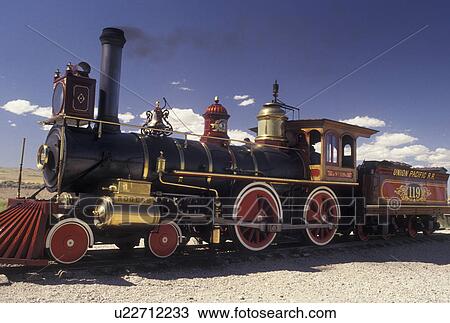 Stock Image -  locomotive, train, Golden Spike National Historic Site, UT, Utah, The 1869 Steam Locomotive 119 at the Golden Spike Nat'l Historic Site where the Union Pacific and Central Pacific rails met on May 10, 1869. Fotosearch